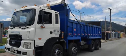 Hyundai HD320 cuatro manos