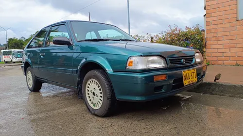 Mazda 323 como nuevo 