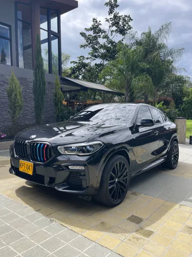BMW X6 M50i      Negro metalizado  Interior cuero cognac  Full equipo