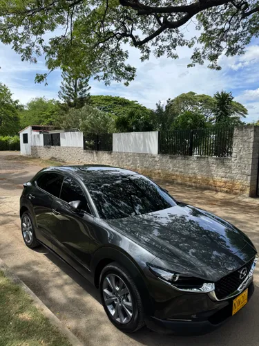  Mazda CX30 Grand Touring 2026  HIBRIDA- Gris Humo  Solo 3.500 km
