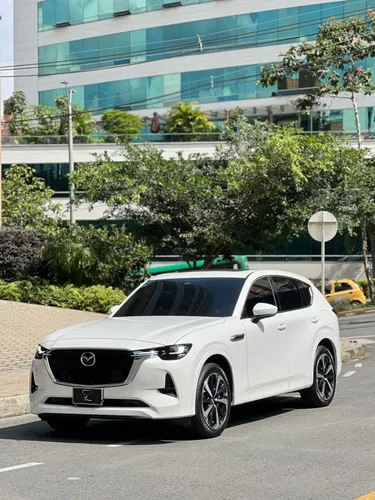 Mazda CX-60 Grand Touring Signature Hybrid 3.3cc turbo. 