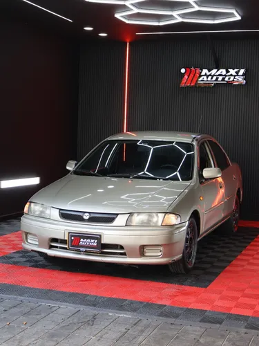 MAZDA ALLEGRO 1998 1.6L MECANICO BEIGE KMS 269.500