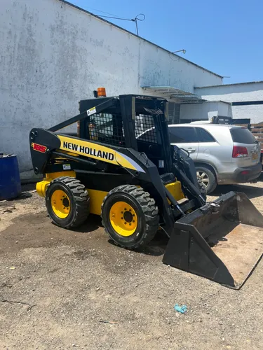 Minicargador New holland L185