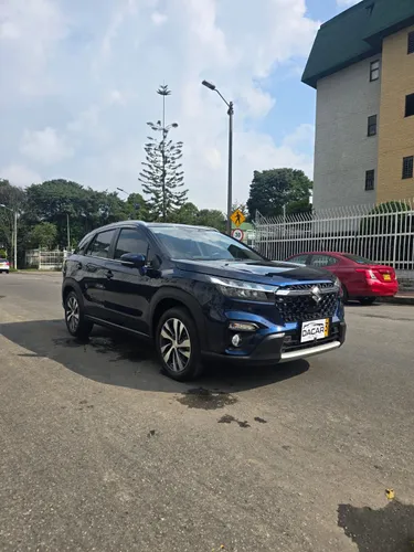 Suzuki scross GLX hibrido 9 mil km escribir al whatsapp