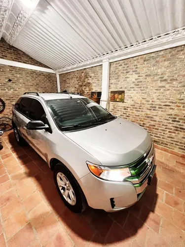 Se vende Ford Edge modelo 2013. EWD cojinería en Cuero vidrios con película de seguridad polarizados clave de seguridad llantas Bridgestone. Motor 3.500 CC a gasolina color Plata puro SOAT y RTM hasta 2027.   Informes al 3125809693