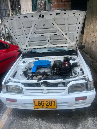 Mazda 323 excelente estado
