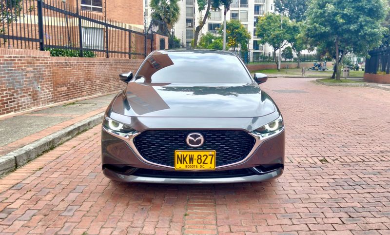 Lindo Mazda 3 Grand Touring híbrido Mhev AT 2025. Como nuevo - imagen secundaria 1