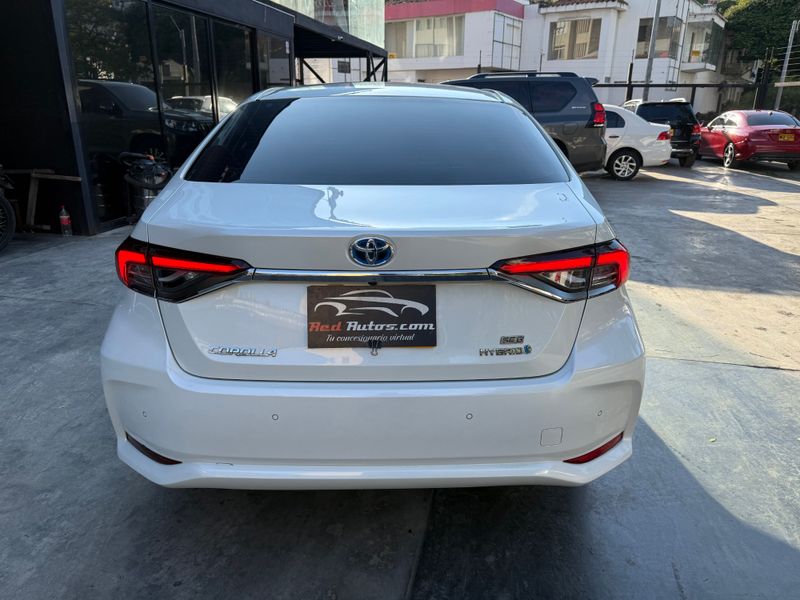 TOYOTA COROLLA 2020  SE-G HÍBRIDO 1.8 AT - POCO KM - imagen secundaria 2