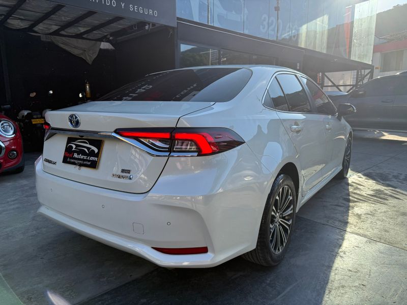 TOYOTA COROLLA 2020  SE-G HÍBRIDO 1.8 AT - POCO KM - imagen secundaria 1